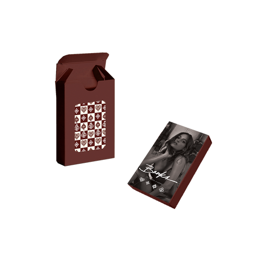 Playing cards in maroon packaging featuring a photo of BANKS