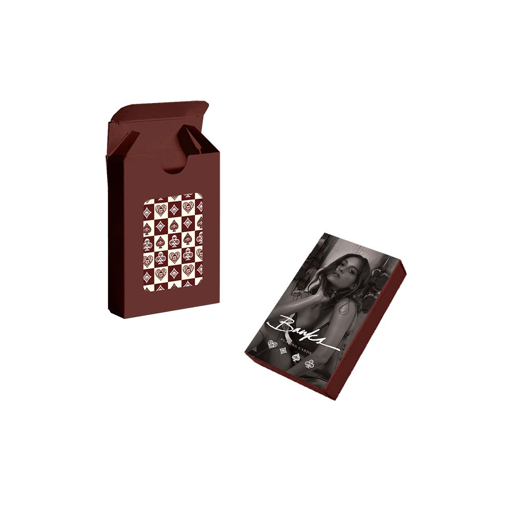 Playing cards in maroon packaging featuring a photo of BANKS